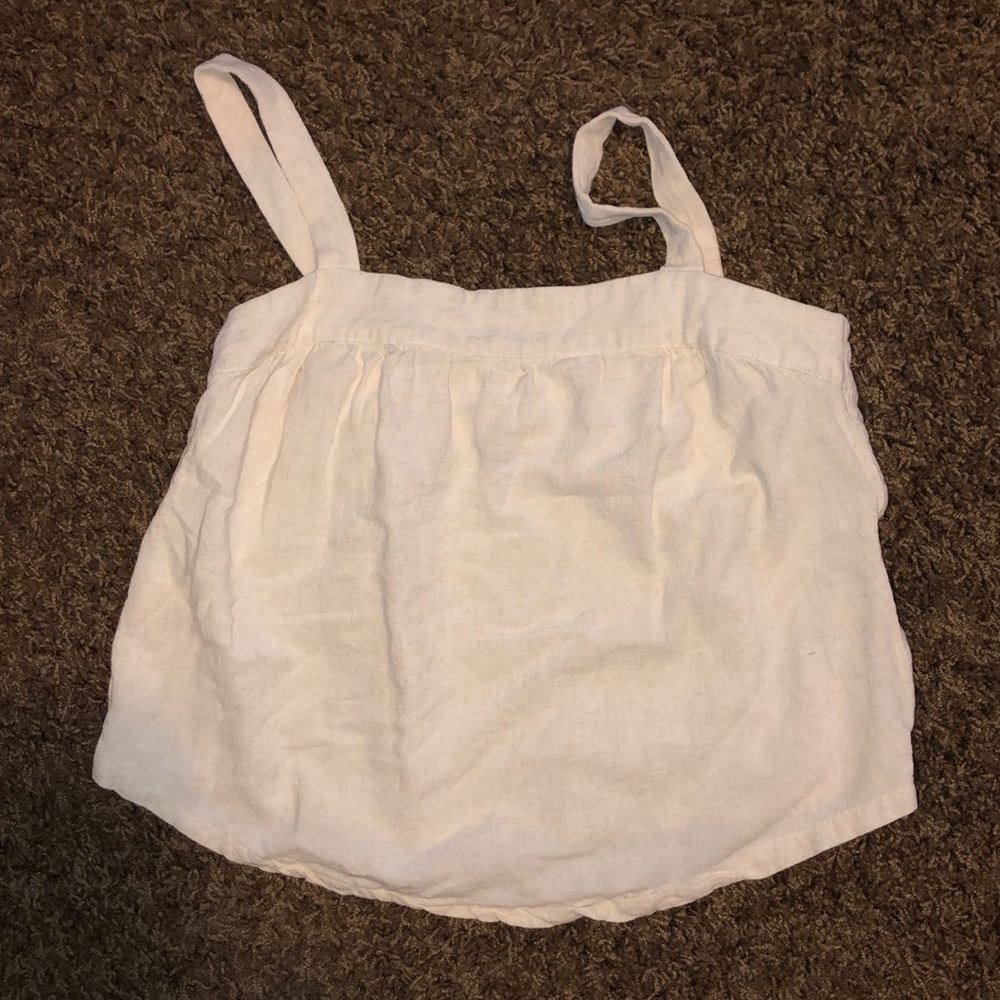 Cream tank with side buttons